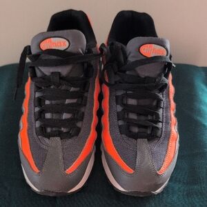 Nike Sneakers with Black and Orange Details
